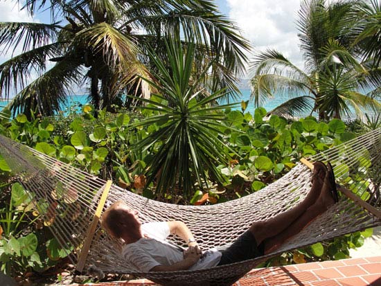 dad in hammock at covecastles
