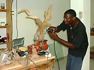 Anguilla sculputre - Cheddie working