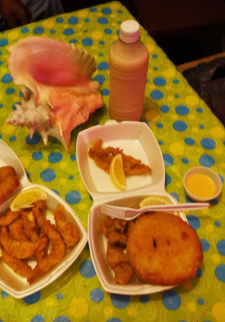 lionfish and cracked conch and johnny cakes at criss conch shack