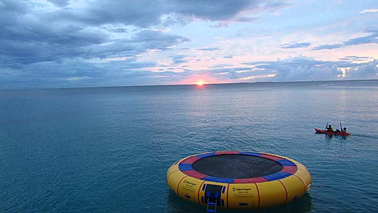 kayak and trampoline pelican trail sunset