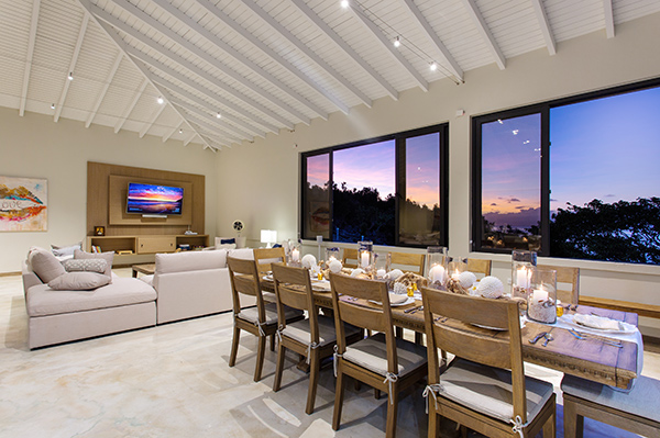Dining at sunset Sandcastle Beach House