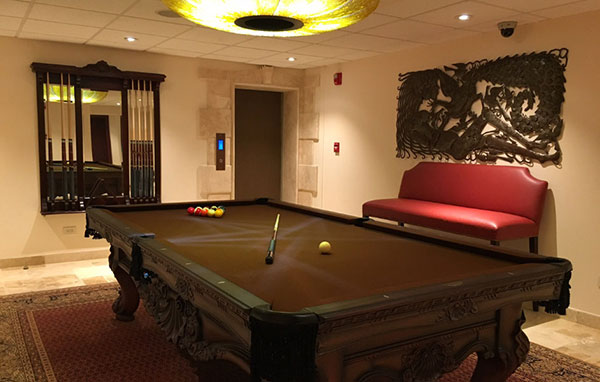 billiard room at quintessence hotel