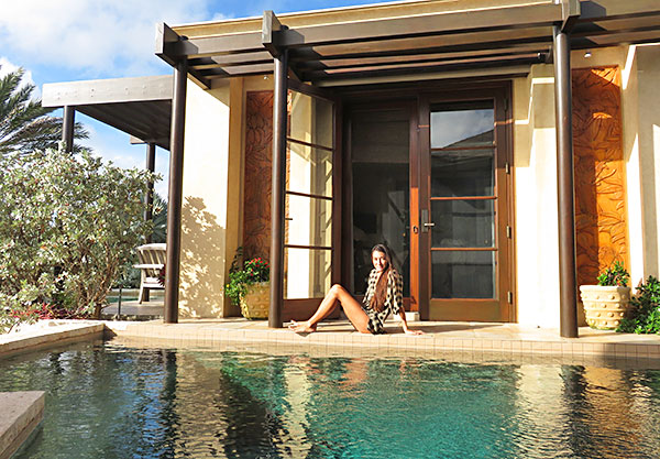 lazing by the pool at bird of paradise villa