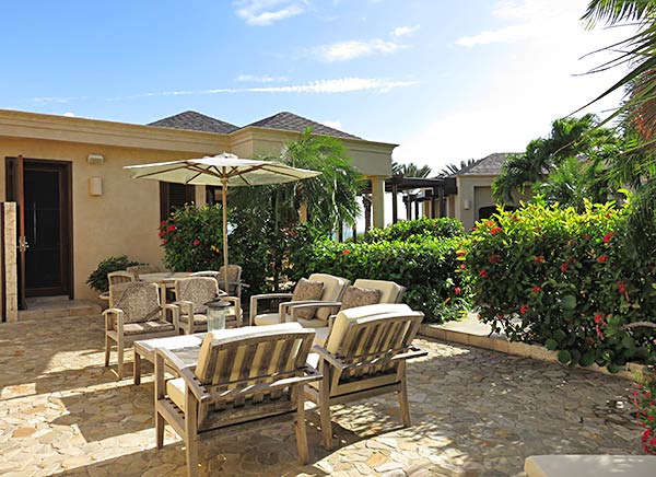 fireplace and outdoor living area at bird of paradise villa