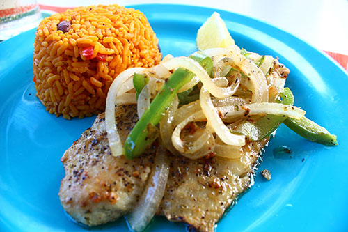 sauteed fish at sharpys smothered in onions and peppers