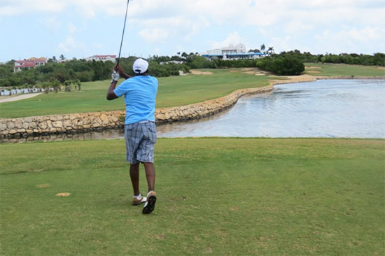 driving down hole 12 at anguilla open 2015