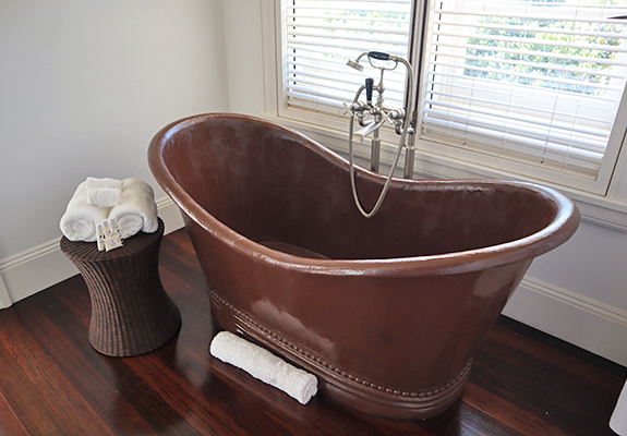 Second floor bathroom sink tub in guest house Ananda at Santosha Villa Estate on Long Bay