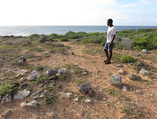 john explaining amerindian site in anguilla