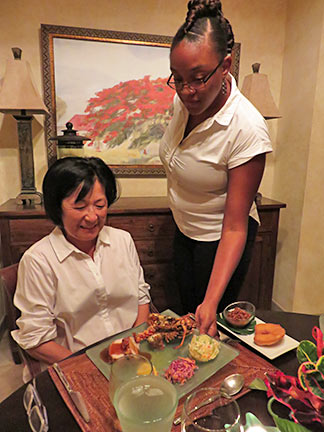 kaira serving dinner at bird of paradise villa