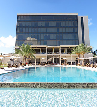 looking up at the reef hotel from the pool