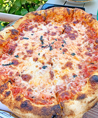 Margherita Homemade Pizza at four seasons bamboo bar and grill