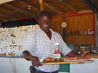 Anguilla restaurants Nat with tray