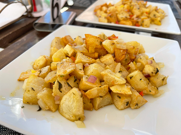 Delicious Sautéed Potatoes  at Olas Tacos
Bar & Grill