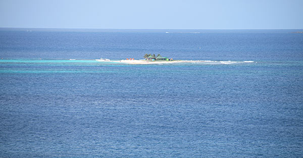 sandy island in the distance from romneys