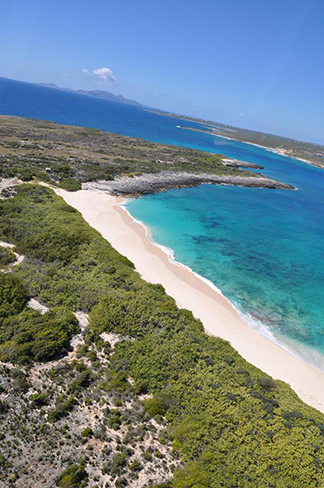 flying over scrub island via helicopter tour with corail helicopters