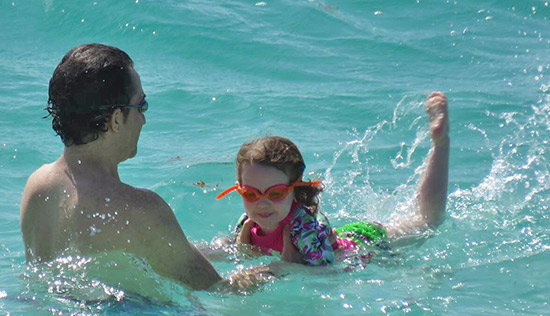 father and daughter in the water at rendezvous