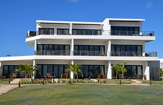 three storey beachfront buildings at the reef