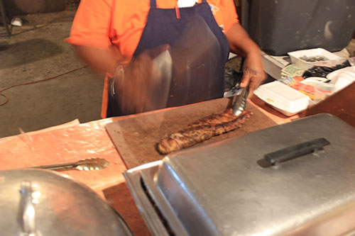 chopping up ribs on the strip