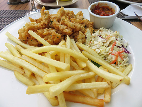 cracked conch lunch at tropical sunset