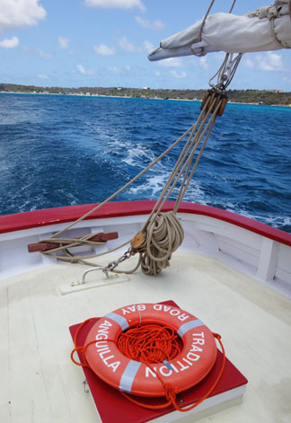 sailing away from sandy ground aboard tradition