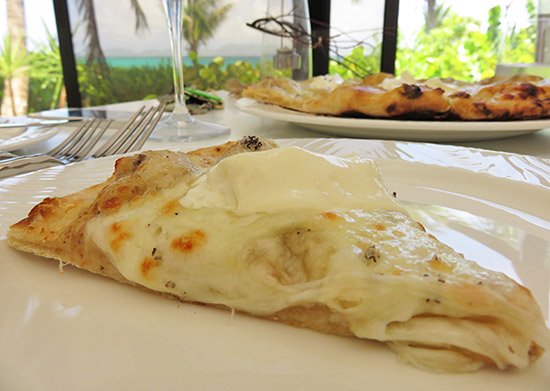 a slice of bianca pizza at covecastles
