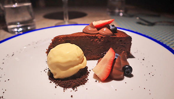 Caprese Chocolate & Almond Cake with Mango Ice-cream at Cips At Belmond Cap Juluca