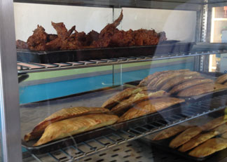 chicken wings, patties at hall's unique bakery