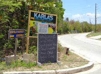Anguilla restaurant, Karla's At De Reef, road sign