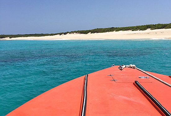 approaching scrub island beach