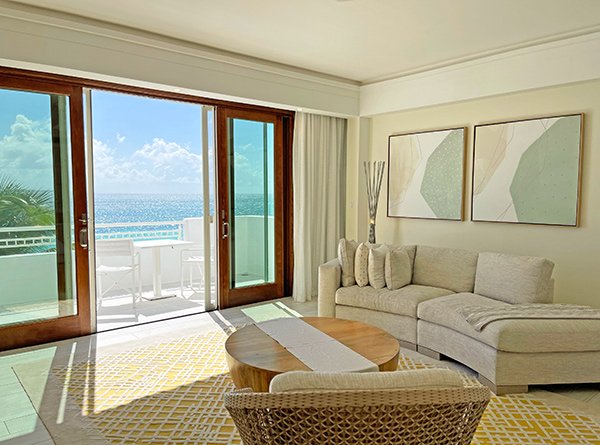 Living area in beachfront room at aurora Anguilla Resort & Golf Club