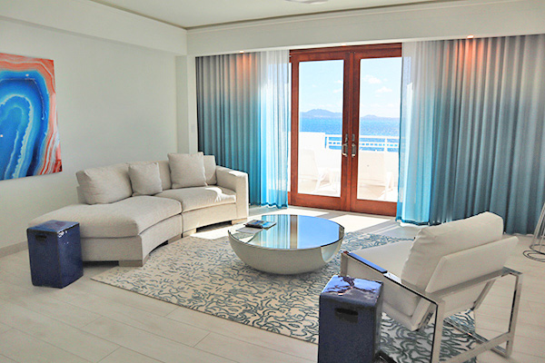 Living area in beachfront room at CuisinArt Golf Resort & Spa