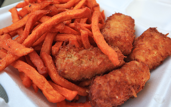 Crispy coconut mahi mahi strips and sweet potato fries