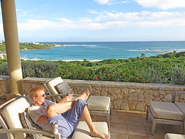 dad lounging at bird of paradise villa