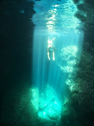 diving into the caves of scrub island