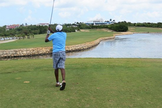 driving down hole 12 at anguilla open 2015