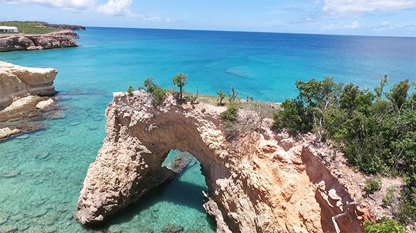 drone shot of the arch in anguilla