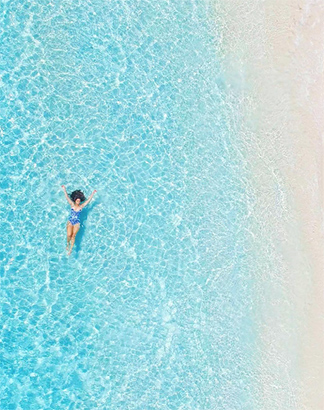 floating in the sea at the reef
