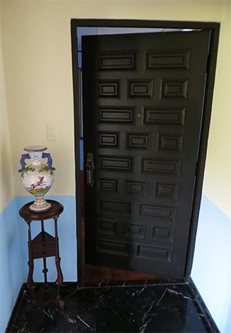 door to bedroom inside gloria vanderbilt suite