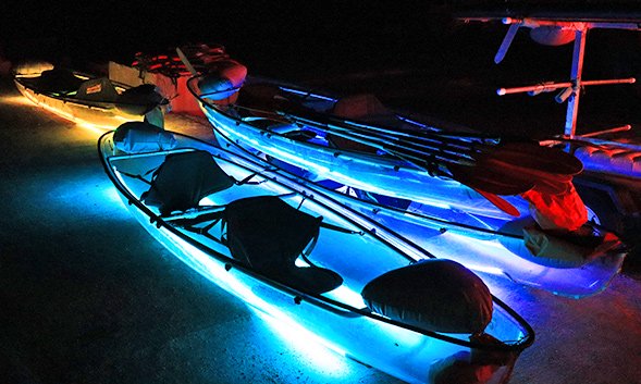 Liquid Glow night kayaking on LED light transperant kayaks