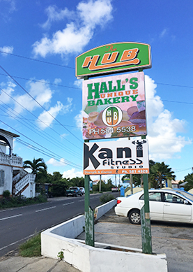 Halls Unique bakery sign from the road