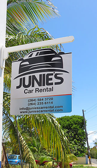 junies car rental sign