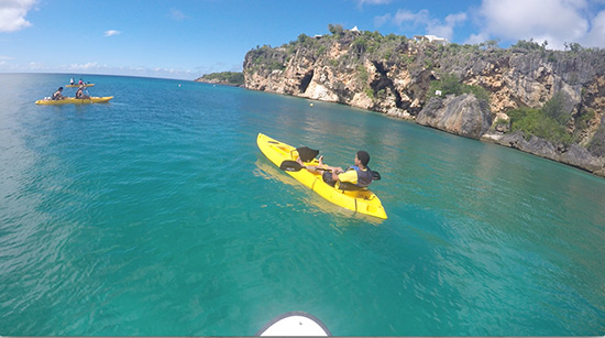 heading out of little bay towards its cliffsides