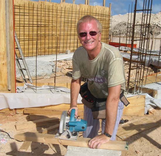 Anguilla builder Ken sawing