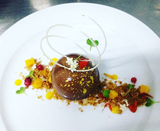 Leonicia Rey Richardson's Dulcey Floating Semi Sphere with Almond Crumb, Forest Berry dessert