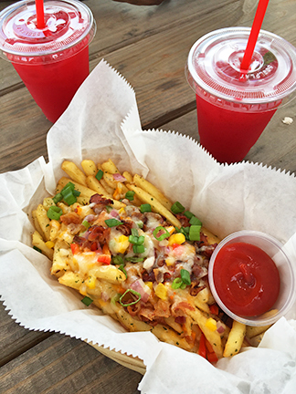 Loaded fries and raspberry juice at cafe 264