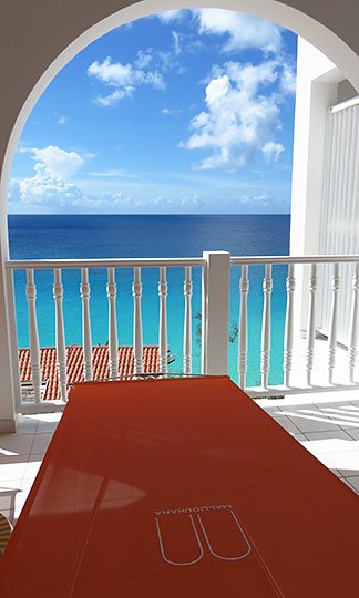 lounge chaises on balcony malliouhana