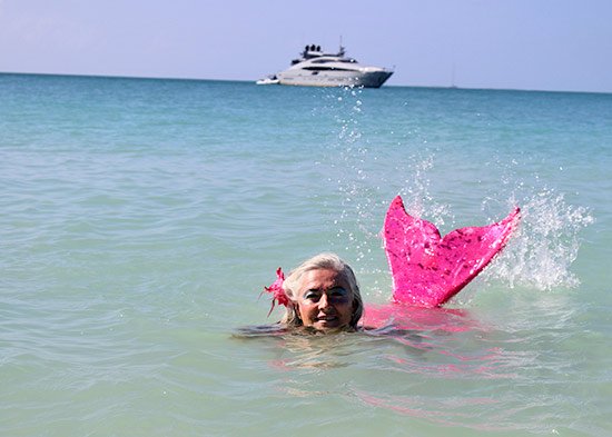 splashing the sea with mermaid tail