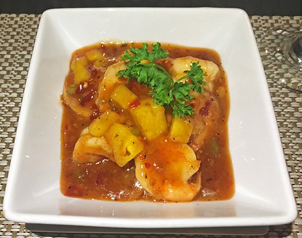 mouth watering pineapple rum glazed shrimp at flavors restaurant