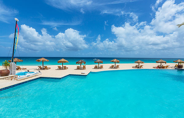 poolside at frangipani hotel on meads bay