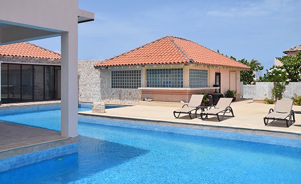 front desk area pool at frangipani